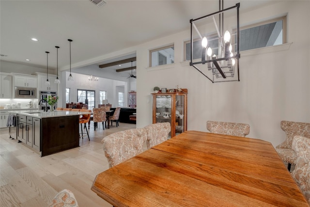 521 Wonderstruck, Liberty Hill, TX 78642 - dining area with a chandelier, recessed lighting, light wood finished floors, and a ceiling fan