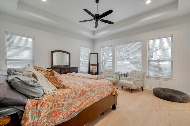 521 Wonderstruck, Liberty Hill, TX 78642 - bedroom with a tray ceiling, wood finished floors, recessed lighting, and ceiling fan