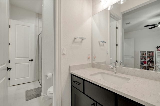 521 Wonderstruck, Liberty Hill, TX 78642 - full bathroom with vanity, a ceiling fan, tile patterned floors, and a spacious closet