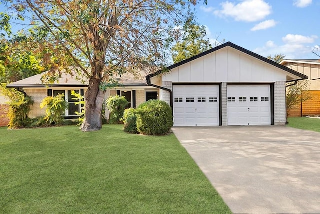 2705 Deeringhill Dr, Austin, TX 78745 - single story home with brick siding, an attached garage, driveway, and a front lawn