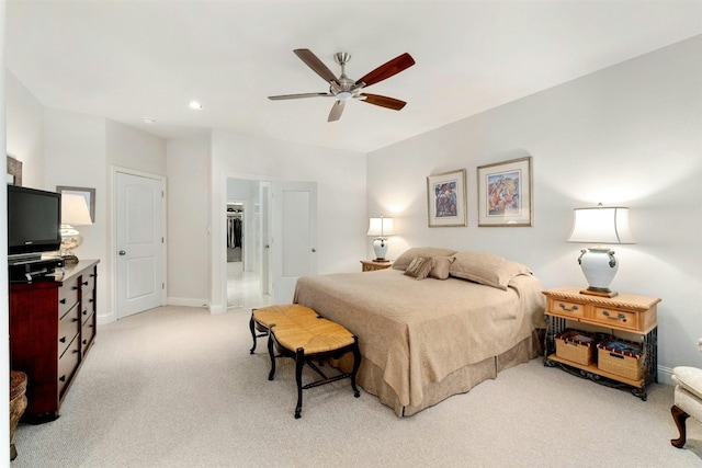 bedroom featuring baseboards, recessed lighting, a ceiling fan, and light colored carpet