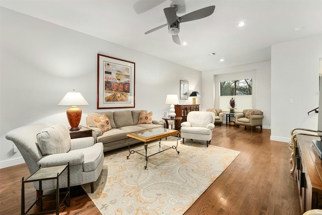 living room with ceiling fan, baseboards, dark wood-type flooring, and recessed lighting