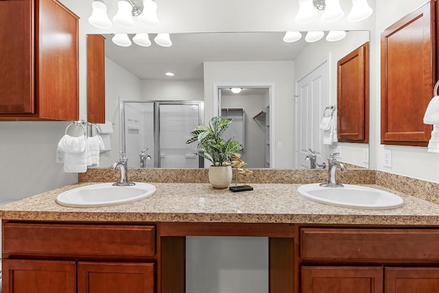 508 Sheldon Lake Dr, Georgetown, TX 78633 - bathroom featuring a shower stall, double vanity, and a closet