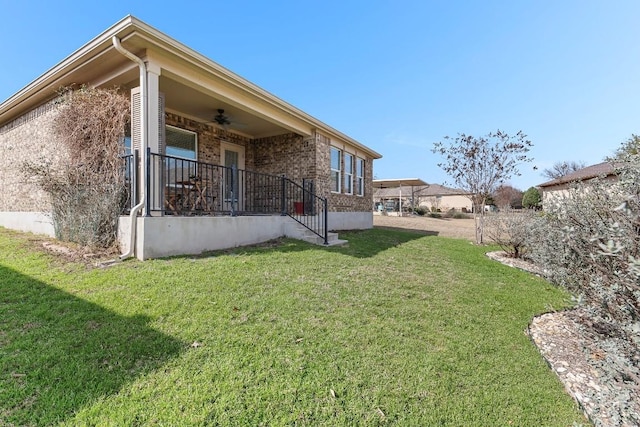 508 Sheldon Lake Dr, Georgetown, TX 78633 - view of green lawn featuring a ceiling fan and covered porch