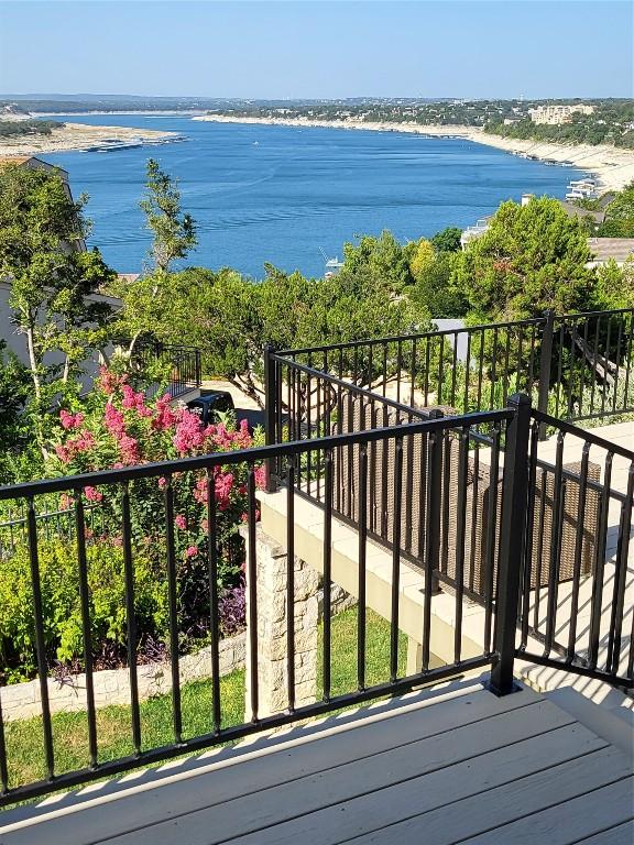 balcony featuring a water view