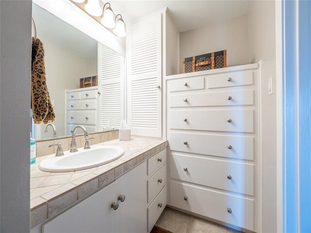 818 Mariner St, Lakeway, TX 78734 - bathroom featuring vanity, tile patterned floors, and a closet