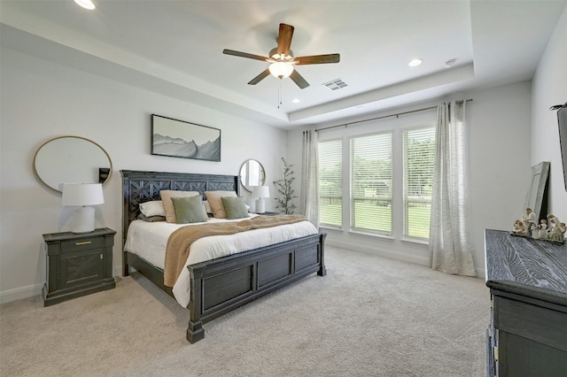 1635 Nature View Loop, Driftwood, TX 78619 - bedroom featuring light colored carpet, a tray ceiling, recessed lighting, baseboards, and a ceiling fan