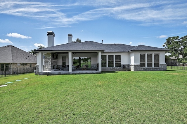 1635 Nature View Loop, Driftwood, TX 78619 - back of property with stone siding, a patio area, a chimney, stucco siding, and ceiling fan