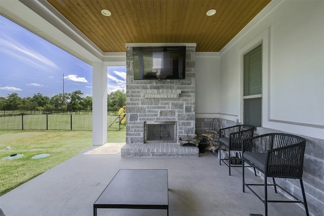 1635 Nature View Loop, Driftwood, TX 78619 - view of patio / terrace with an outdoor stone fireplace