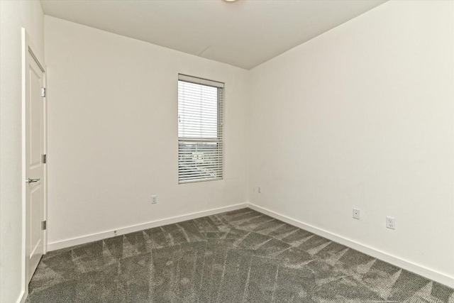1912 Bunche Rd Unit B, Austin, TX 78721 - unfurnished room featuring dark carpet and baseboards
