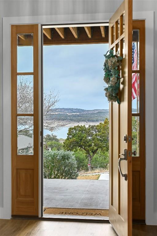 233 Lakefront Dr, Lago Vista, TX 78645 - doorway to outside featuring a wealth of natural light