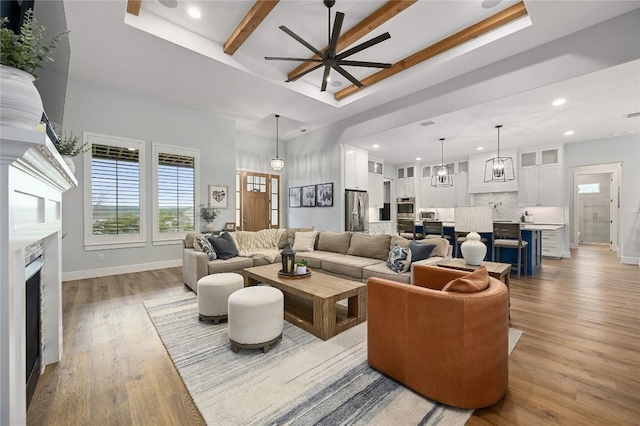 233 Lakefront Dr, Lago Vista, TX 78645 - living room featuring baseboards, a high ceiling, recessed lighting, a ceiling fan, and light wood-style flooring