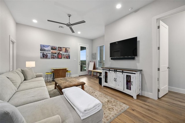 233 Lakefront Dr, Lago Vista, TX 78645 - living room with ceiling fan, wood finished floors, and recessed lighting