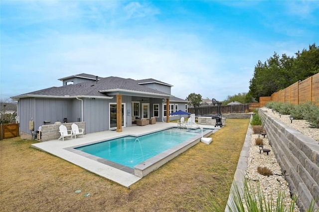 233 Lakefront Dr, Lago Vista, TX 78645 - view of swimming pool with a fenced backyard, a fenced in pool, a lawn, and a patio area