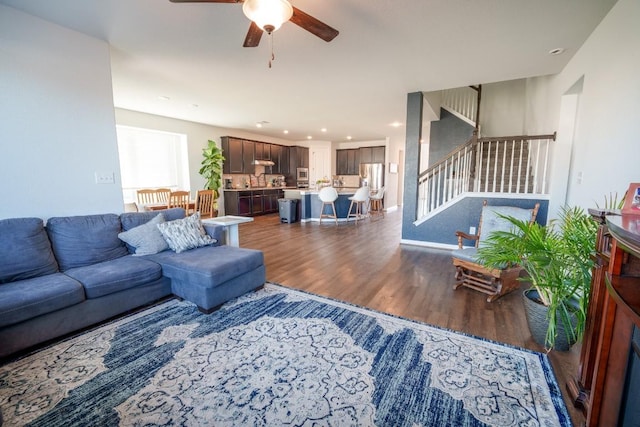 5864 Bianca Dr, Round Rock, TX 78665 - living area featuring stairs, ceiling fan, dark wood-style flooring, and recessed lighting