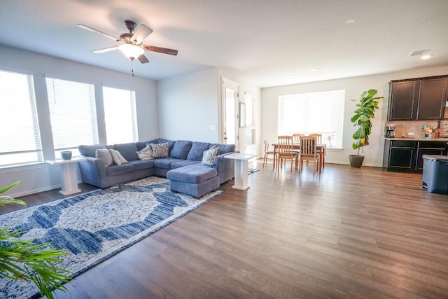 5864 Bianca Dr, Round Rock, TX 78665 - living area with wood finished floors, a ceiling fan, and baseboards