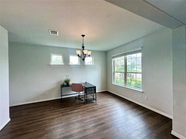 5864 Bianca Dr, Round Rock, TX 78665 - dining space featuring dark wood finished floors, plenty of natural light, and a chandelier