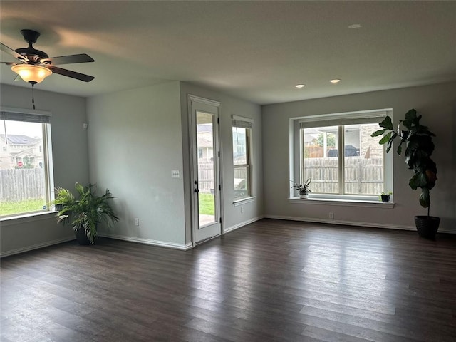 5864 Bianca Dr, Round Rock, TX 78665 - spare room featuring healthy amount of natural light, dark wood-style flooring, a ceiling fan, and recessed lighting