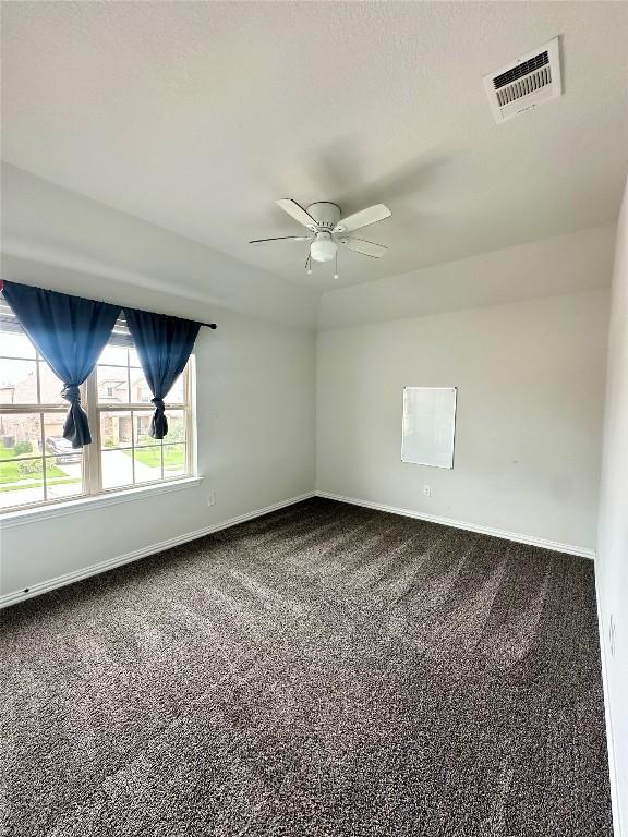 5864 Bianca Dr, Round Rock, TX 78665 - carpeted spare room featuring ceiling fan and baseboards