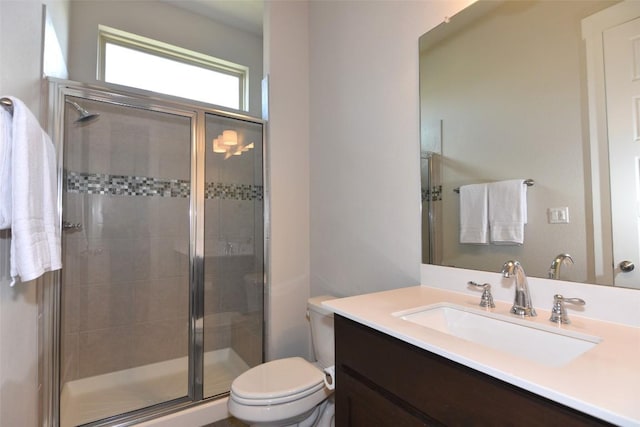 2617 Long Lasso Pass, Leander, TX 78641 - bathroom with toilet, vanity, and a shower stall
