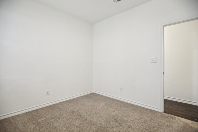 1011 Moose Rd, Hutto, TX 78634 - empty room with carpet and baseboards