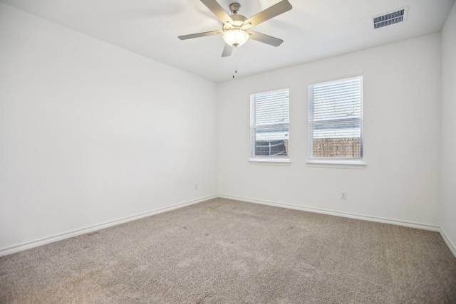 1011 Moose Rd, Hutto, TX 78634 - unfurnished room featuring carpet, a ceiling fan, and baseboards