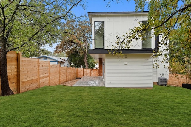 1135 Salina St, Austin, TX 78702 - back of house featuring central air condition unit and a patio
