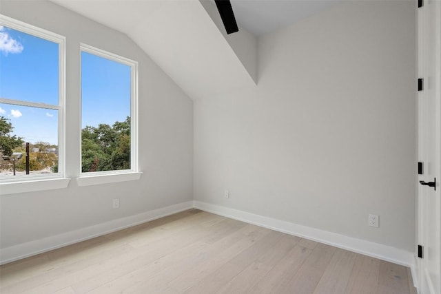 1135 Salina St, Austin, TX 78702 - additional living space featuring light wood-type flooring, baseboards, lofted ceiling, and ceiling fan