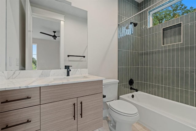1135 Salina St, Austin, TX 78702 - bathroom featuring vanity, plenty of natural light, toilet, and bathing tub / shower combination