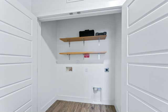 6444 Burnet Rd Unit 308, Austin, TX 78757 - laundry area featuring gas dryer hookup, electric dryer hookup, dark wood-style flooring, and hookup for a washing machine