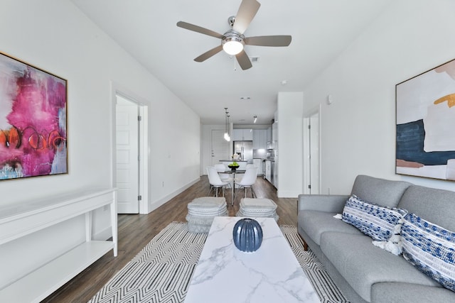 6444 Burnet Rd Unit 308, Austin, TX 78757 - living area with ceiling fan and dark wood-type flooring