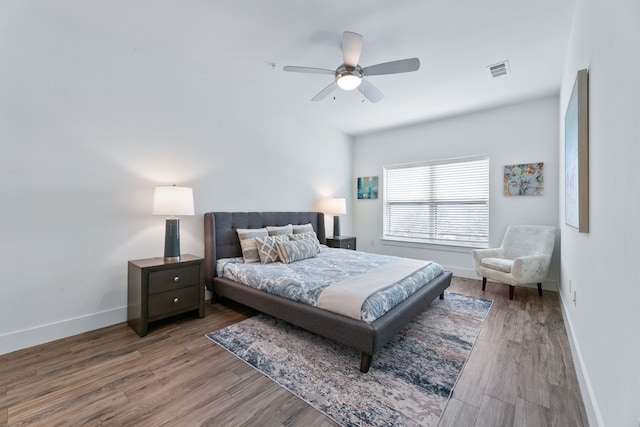 6444 Burnet Rd Unit 308, Austin, TX 78757 - bedroom with wood finished floors and a ceiling fan
