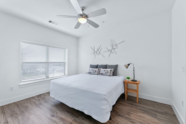 6444 Burnet Rd Unit 308, Austin, TX 78757 - bedroom with wood finished floors and a ceiling fan