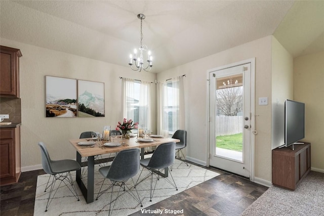 214 Teron Dr, San Marcos, TX 78666 - dining space featuring an inviting chandelier and baseboards