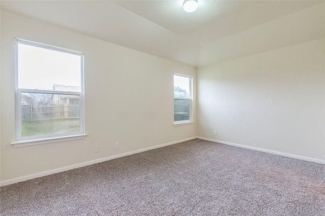 214 Teron Dr, San Marcos, TX 78666 - spare room featuring baseboards and carpet