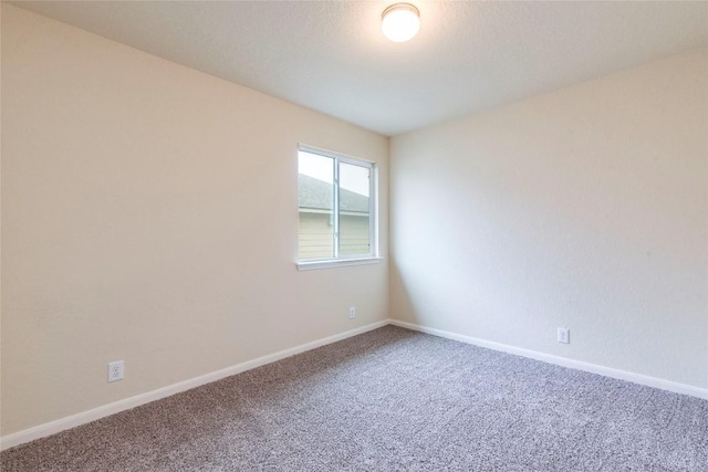 214 Teron Dr, San Marcos, TX 78666 - unfurnished room featuring carpet floors and baseboards