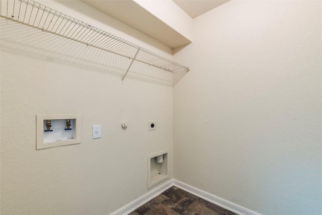 214 Teron Dr, San Marcos, TX 78666 - laundry room featuring laundry area, hookup for a washing machine, hookup for an electric dryer, hookup for a gas dryer, and baseboards