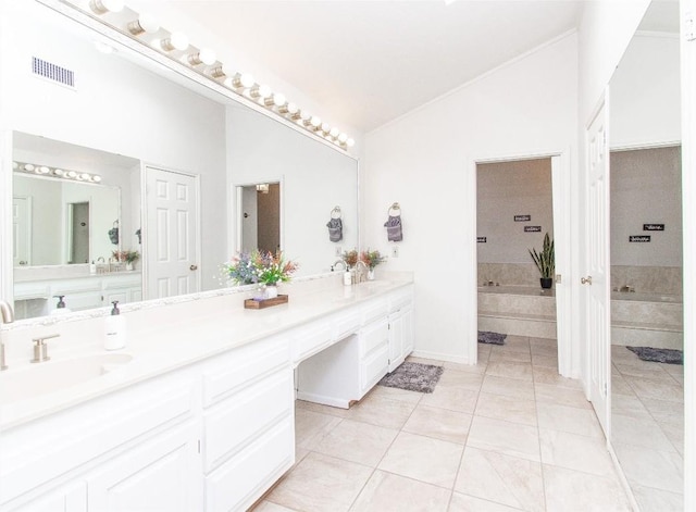 1414 Eagle Trl, Copperas Cove, TX 76522 - bathroom with double vanity, a bath, and tile patterned flooring