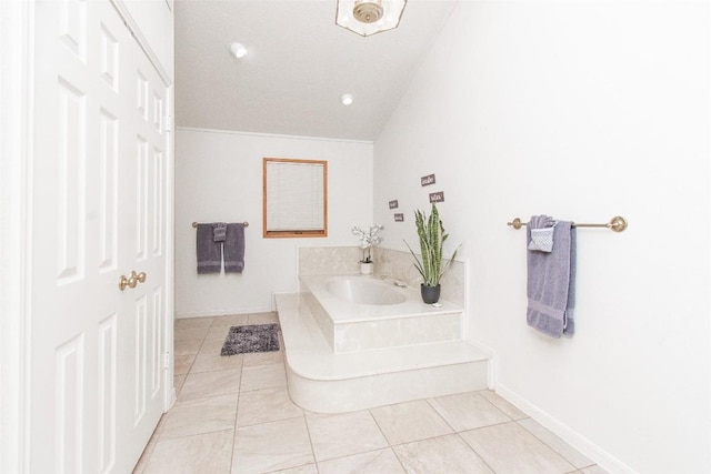 1414 Eagle Trl, Copperas Cove, TX 76522 - bathroom with tile patterned floors, lofted ceiling, and baseboards