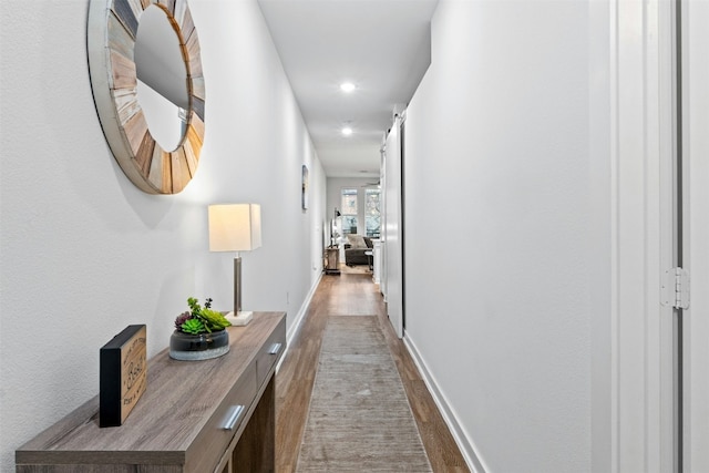 1900 Barton Springs Rd Unit 4040, Austin, TX 78704 - hallway with wood finished floors and recessed lighting