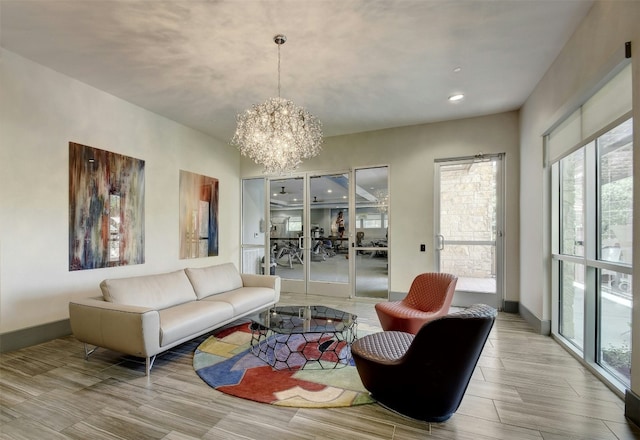 1900 Barton Springs Rd Unit 4040, Austin, TX 78704 - living area with a chandelier, healthy amount of natural light, wood finished floors, and recessed lighting