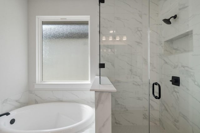 1205 N Roger Hanks Pkwy, Dripping Springs, TX 78620 - bathroom with a freestanding tub, a marble finish shower, and a wealth of natural light