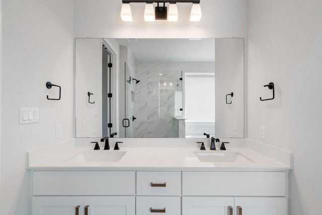 1205 N Roger Hanks Pkwy, Dripping Springs, TX 78620 - full bath featuring a sink, a marble finish shower, and double vanity