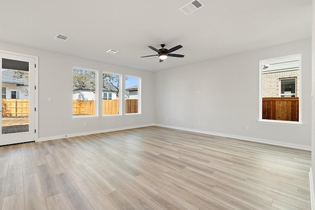 1205 N Roger Hanks Pkwy, Dripping Springs, TX 78620 - empty room featuring ceiling fan, light wood finished floors, visible vents, and baseboards