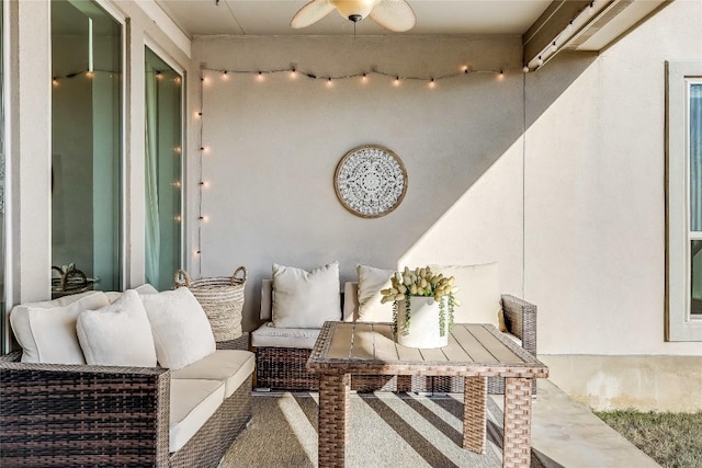 interior space featuring ceiling fan and an outdoor living space