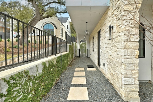 view of property exterior with stone siding