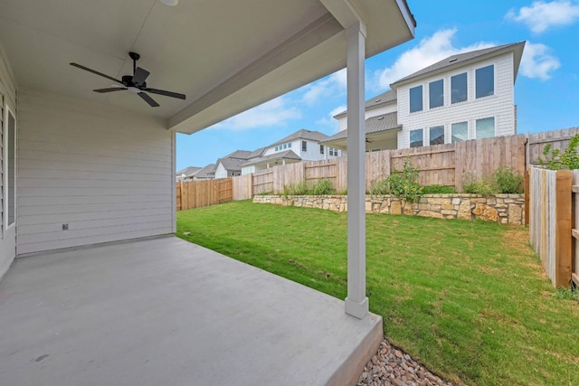 216 Crescent Heights Dr, Georgetown, TX 78628 - fenced backyard with ceiling fan, a patio, and a residential view