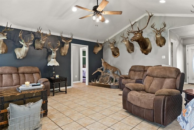 living room featuring lofted ceiling, light tile patterned floors, a ceiling fan, and crown molding