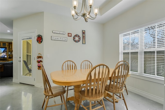 139 W Maple Dr, Marble Falls, TX 78654 - dining area with a chandelier, baseboards, recessed lighting, and finished concrete floors