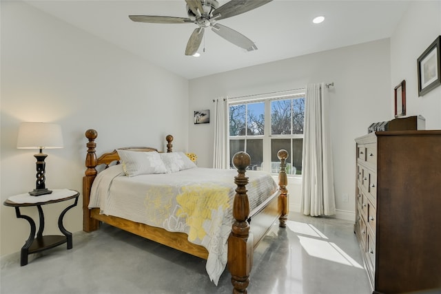 139 W Maple Dr, Marble Falls, TX 78654 - bedroom with concrete flooring, ceiling fan, recessed lighting, and baseboards